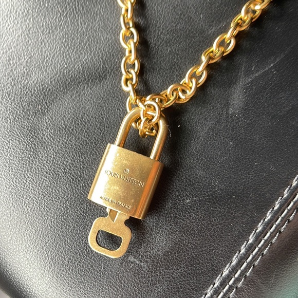 Authentic Louis Vuitton lock necklace —purchased for $280. NWT - Picture 7 of 8
